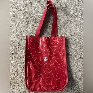 small red lulu bag